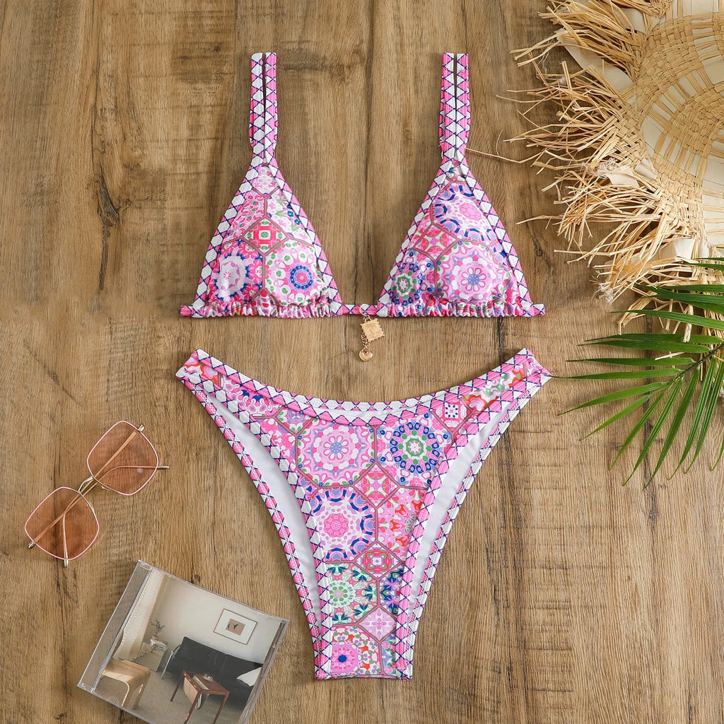 Retro printed women's bikini swimwear in polyester fabric showing orange, pink, black, and blue colour options
