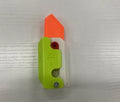 Carrot-shaped 3D printed plastic gravity fidget knife with orange purple green colour scheme