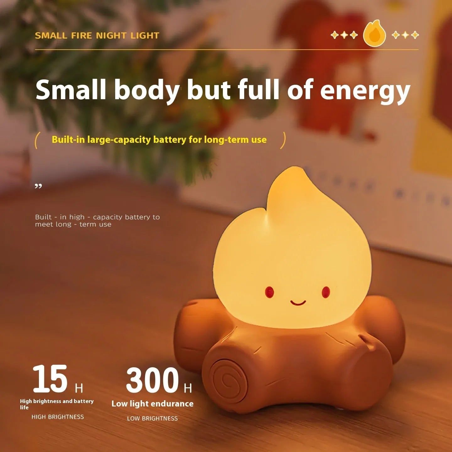 Cartoon small fire pile silicone night lamp with ABS shade on a wooden surface.