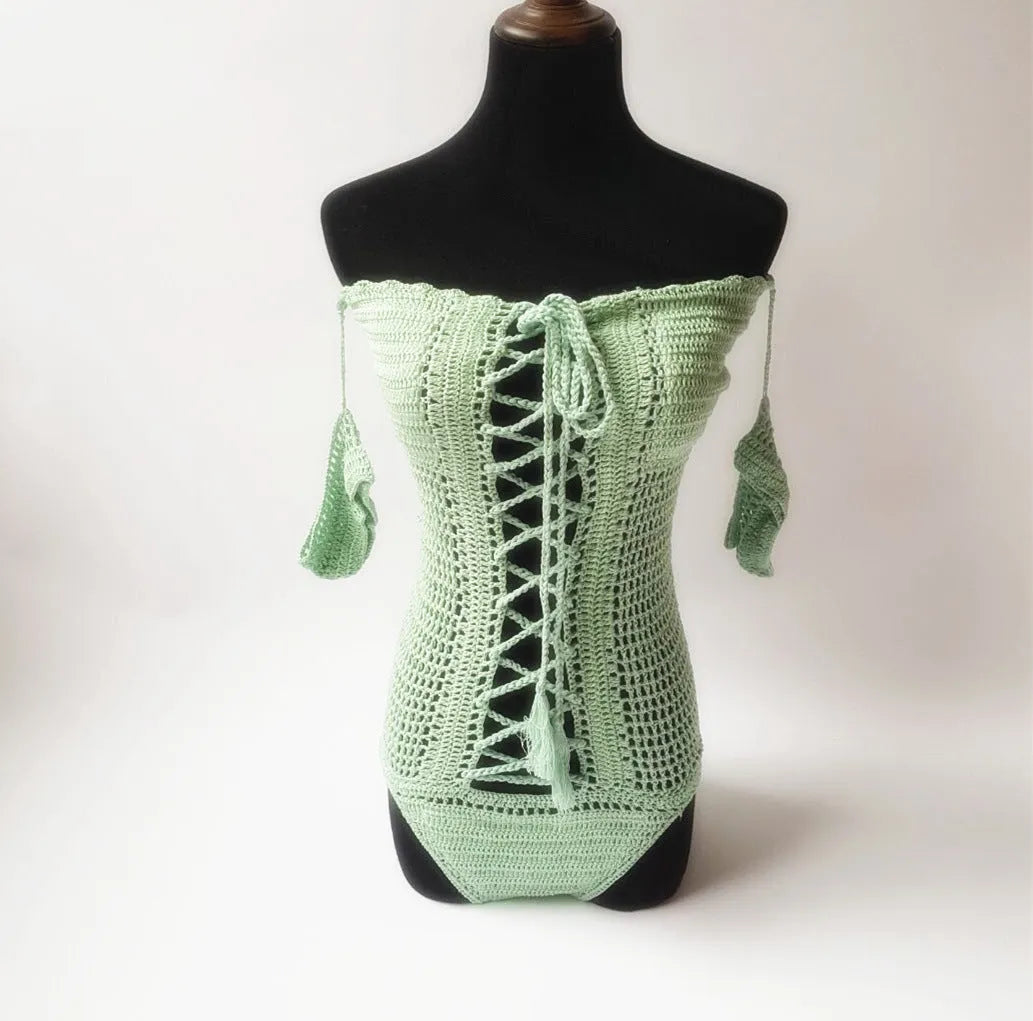 Off-shoulder one-piece swimsuit in polyester fabric on mannequin