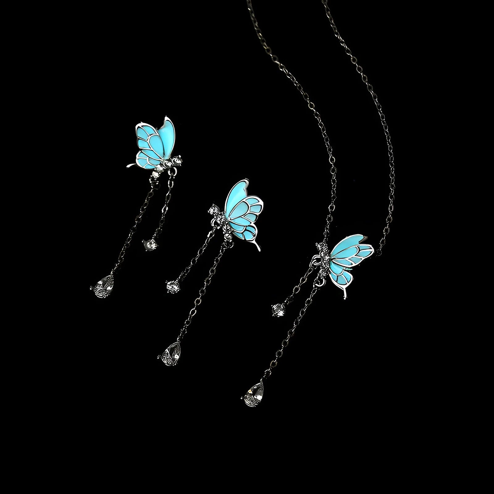 Sterling silver S925 butterfly tassel necklace with noctilucent luminous pendant and adjustable O-ring chain on white background