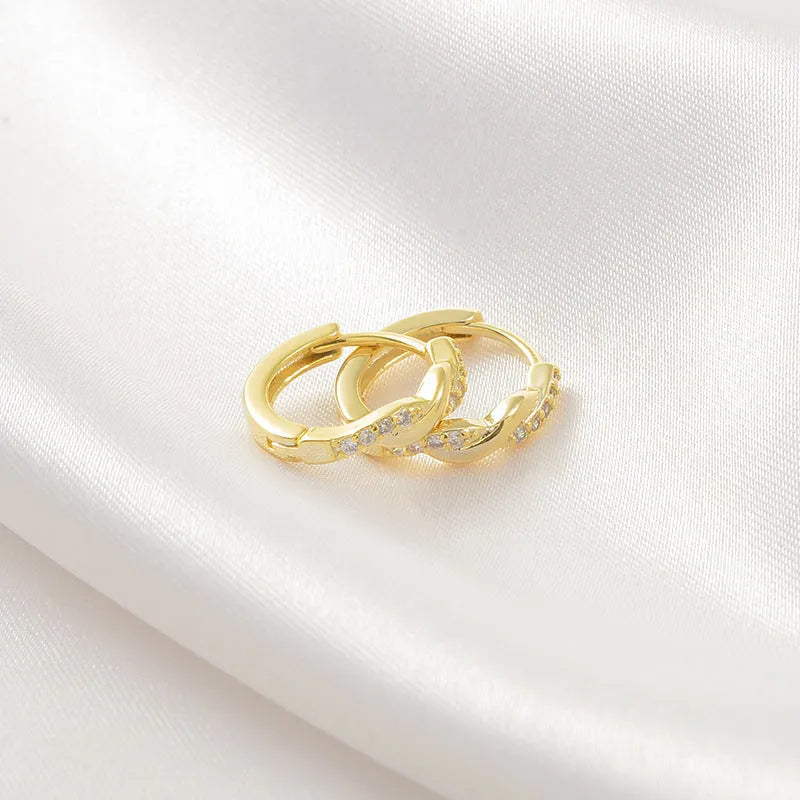 Geometric interwoven hemp rope earclip earrings for women in gold and silver colour options.