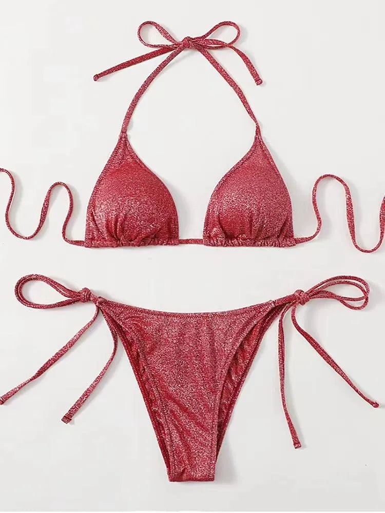 Women's bandage-style bikini swimsuit in black, shown as a two-piece set.