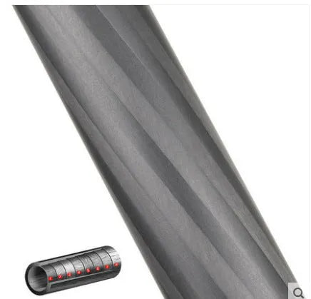 Black carbon fibre SLR camera monopod extended to maximum height with six visible sections