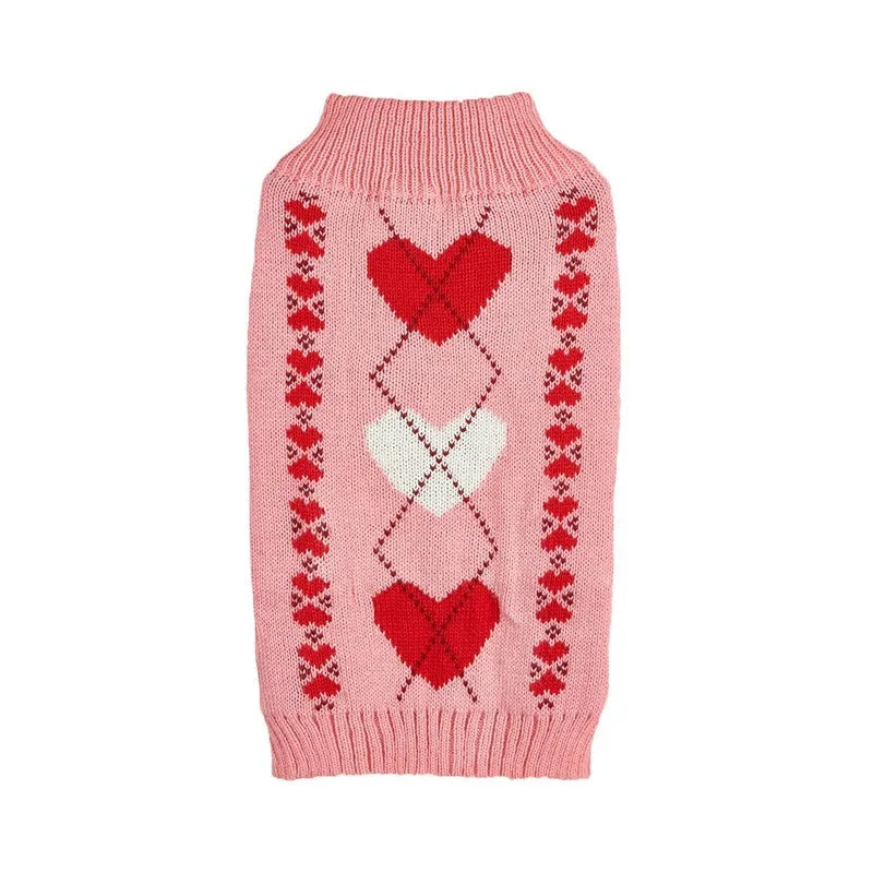 Red acrylic dog sweater with a large white love heart design on the back.