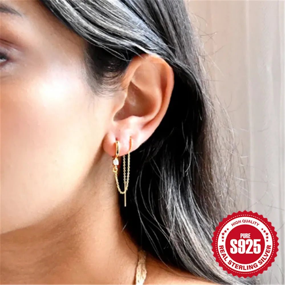 S925 sterling silver geometric ear clip stud earrings with flower, tassel, and chain design in golden electroplated finish.