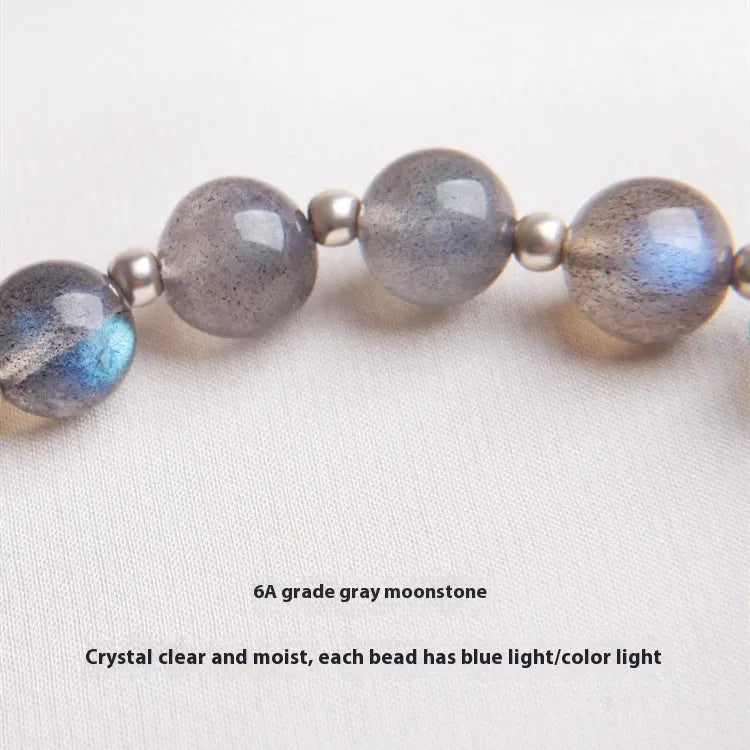 Grey moonlight silver women's bracelet with 7.5mm crystal and honeysuckle and animal charms.