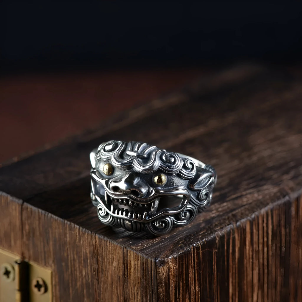 Silver open ring with detailed Jibeast pattern showing animal and zodiac modelling in retro style