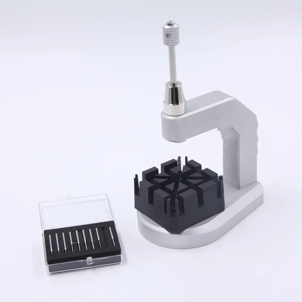 Silver professional press strap removal tool made of tool steel for watch and electronics repair.