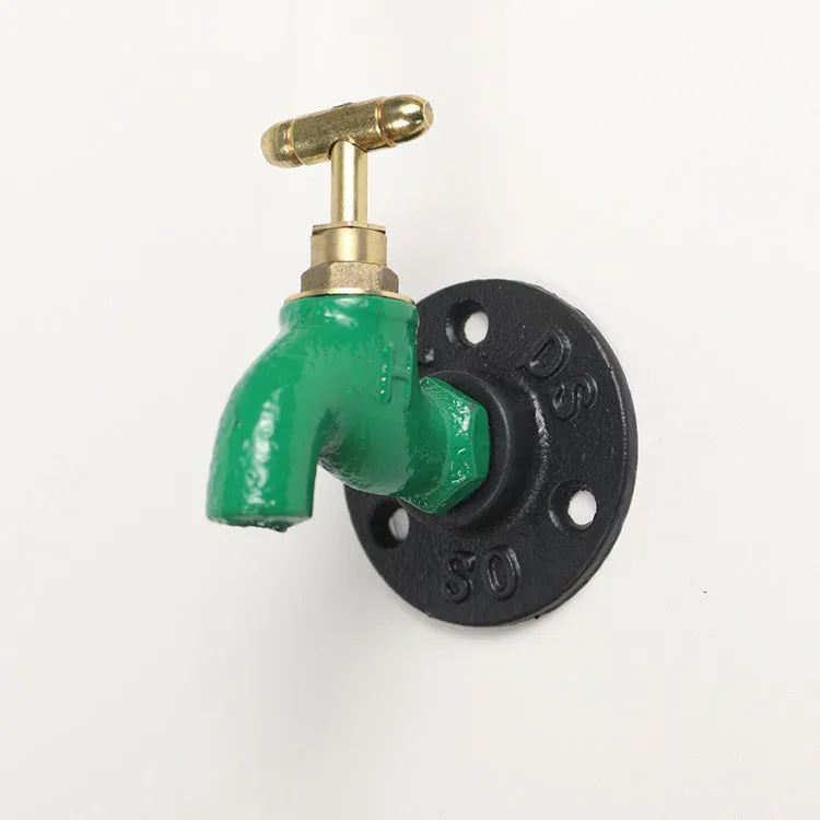 Water pipe style metal towel rack hook mounted on wall with towels hanging