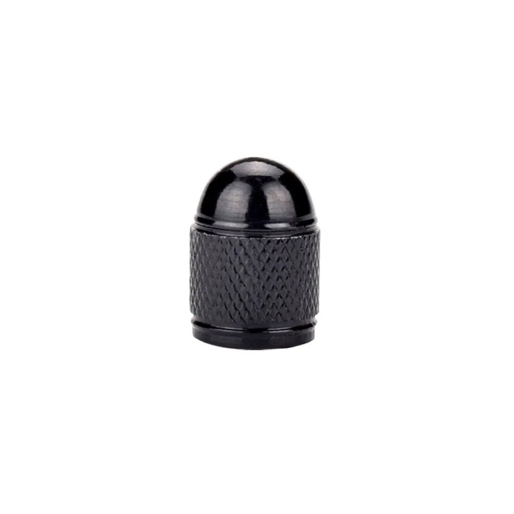 Aluminium mountain bike tyre valve dust cap in gold, red, silver, blue, and black colours.