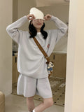 Women's milk blue knitted sweater and shorts set with animal embroidery, Japanese Korean casual style.