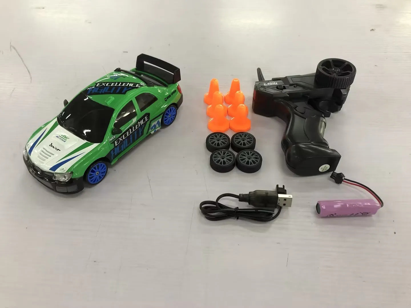 2.4G RC drift car 4WD 1:24 scale remote control toy GTR model in classic style on road with traffic cones