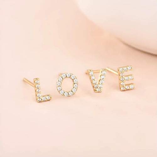 Brass gold plated alphabet letter earrings showing zircon detailing on copper base with 26 English letters available