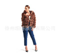 Loose-fitting hooded women's coat in artificial fur, shown in brown and white silver fox colours.