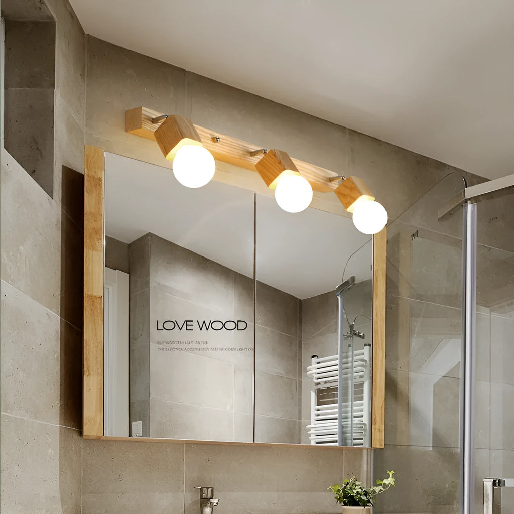 24cm round mirror finish LED wall lamp with a single light head for vanity lighting.