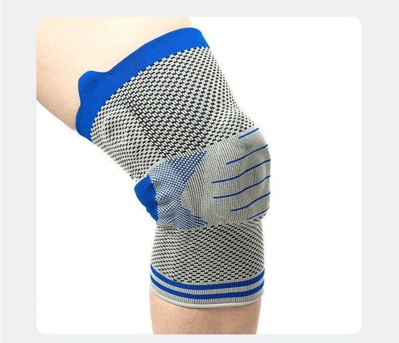 Cotton knee pad with silicone massage spring bar shock absorber in black and gray colour.