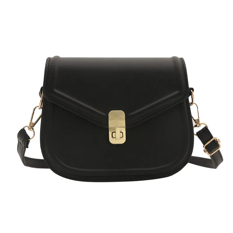 Niche texture shoulder messenger bag in soft PU leather with clamshell opening and horizontal square shape