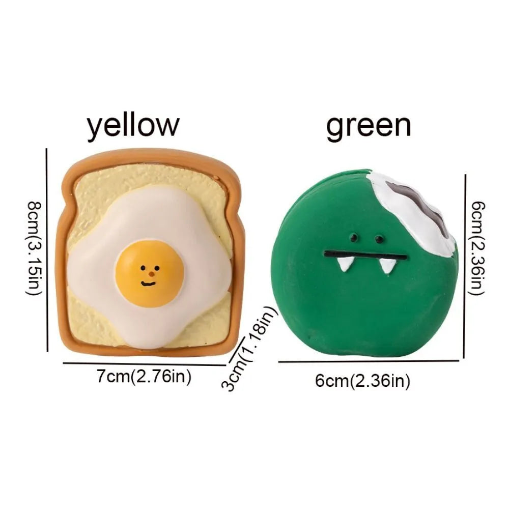 Yellow and green cartoon bread shaped latex dog squeaky chew toy on a white background.