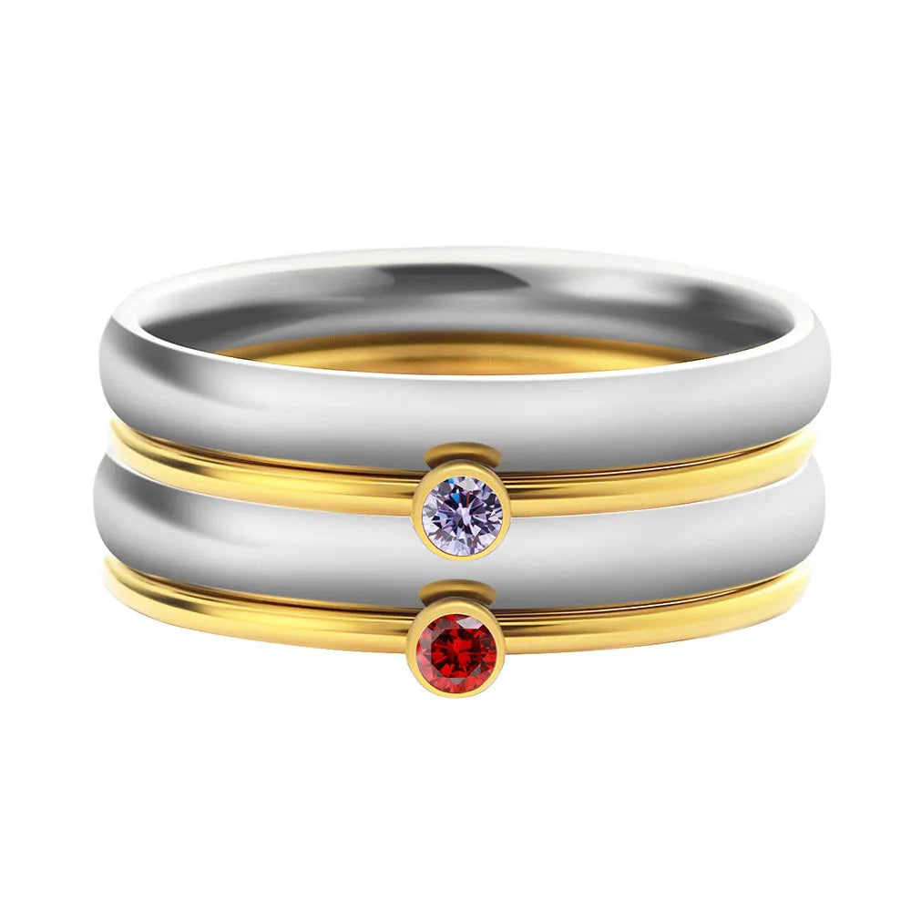 December birthstone ring with blue and turquoise superimposition on geometrically engraved titanium steel band