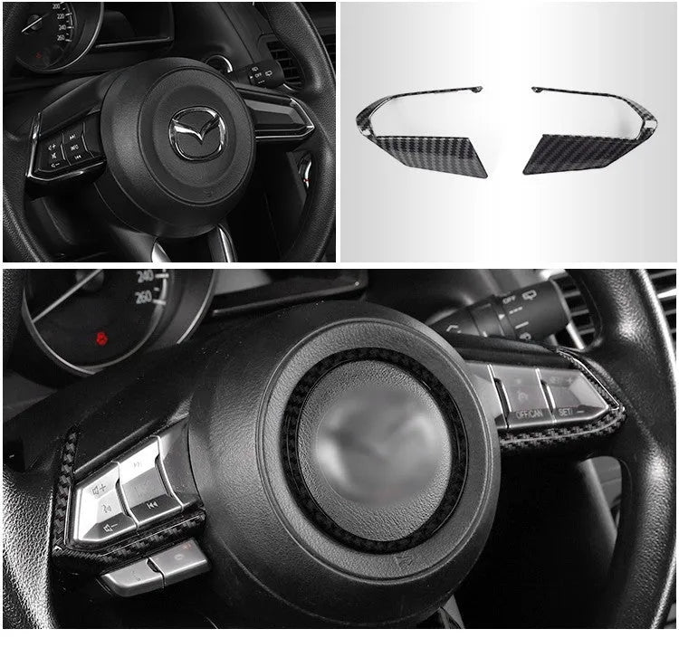 Pair of black ABS plastic steering wheel frame decoration panels for car interior trim.