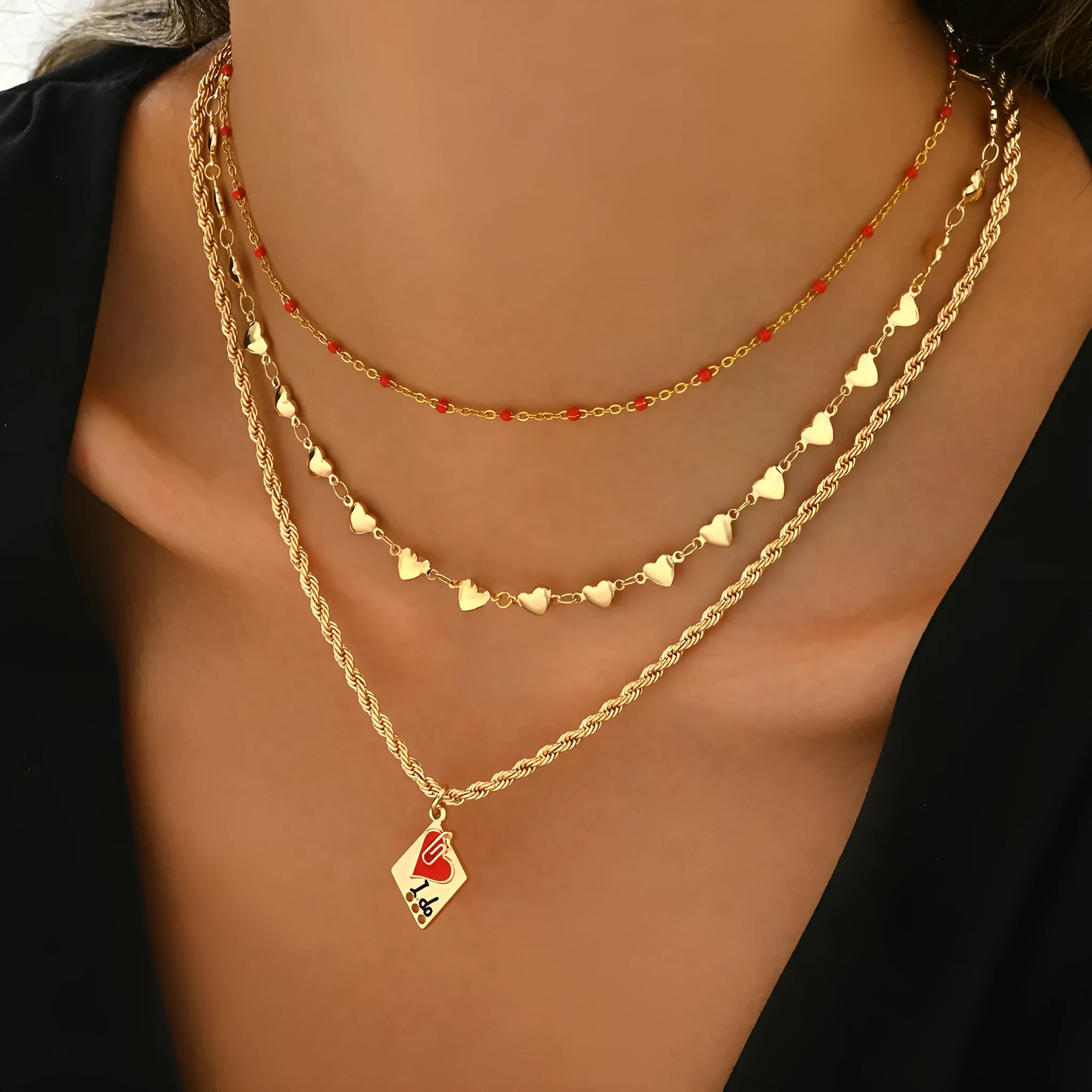 Geometric heart pendant on an adjustable three-layer zinc alloy clavicle chain necklace.