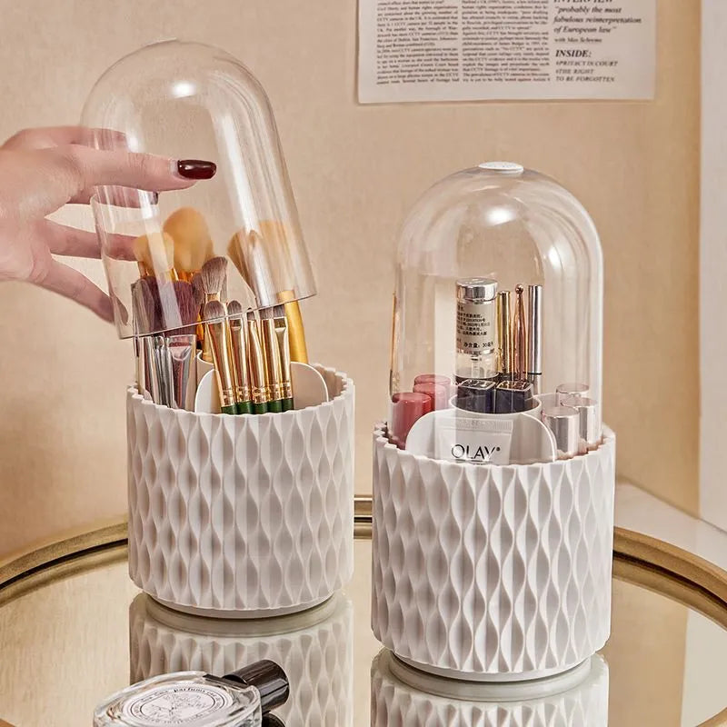 White rotating transparent makeup brush storage tube with dust cover lid on desktop