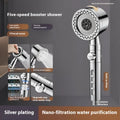 Silver portable shower head with multiple spray function settings.