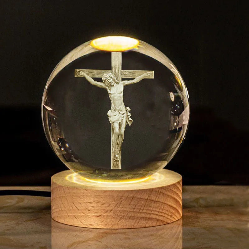 White crystal cross ornament with 6cm ball on wooden warm light base