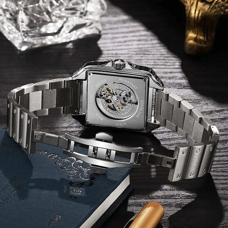 Men's square automatic watch with diamond-studded bezel on a stainless steel belt