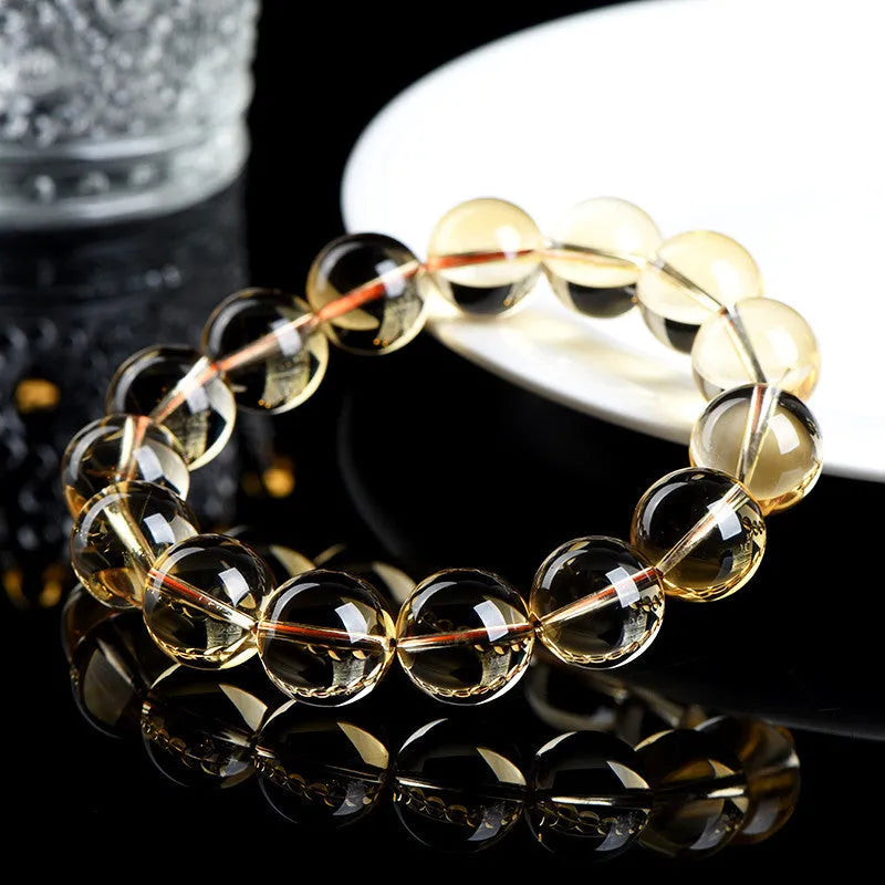 Natural citrine scattered beads ball bracelet in 7A grade, shown in gold and amber tones with textured bead design.