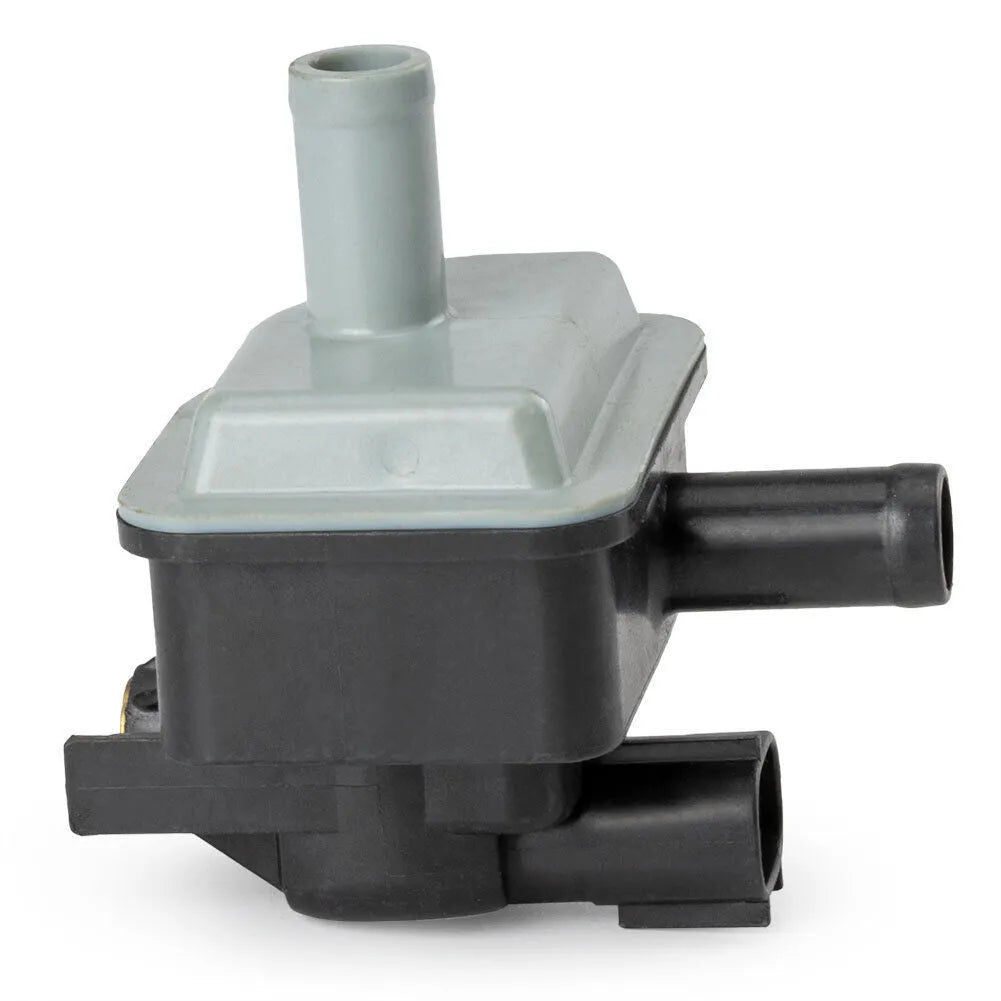 Toyota vacuum solenoid valve part number 90910-12283, a black electromagnetic component.