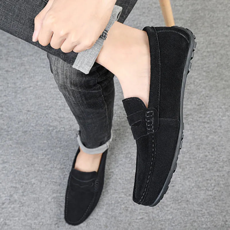 Men's solid colour suede loafers slip-on shoes with round toe and flat rubber sole.