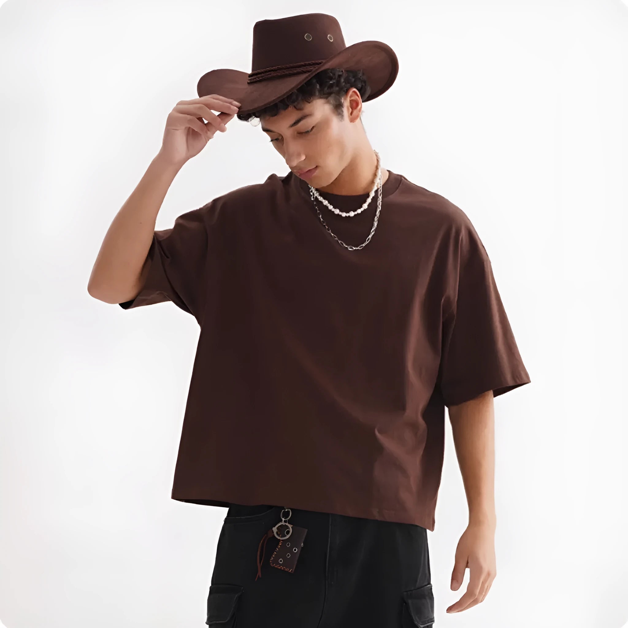 Man wearing a loose-fit apricot coloured pure cotton t-shirt, American style, short sleeves.