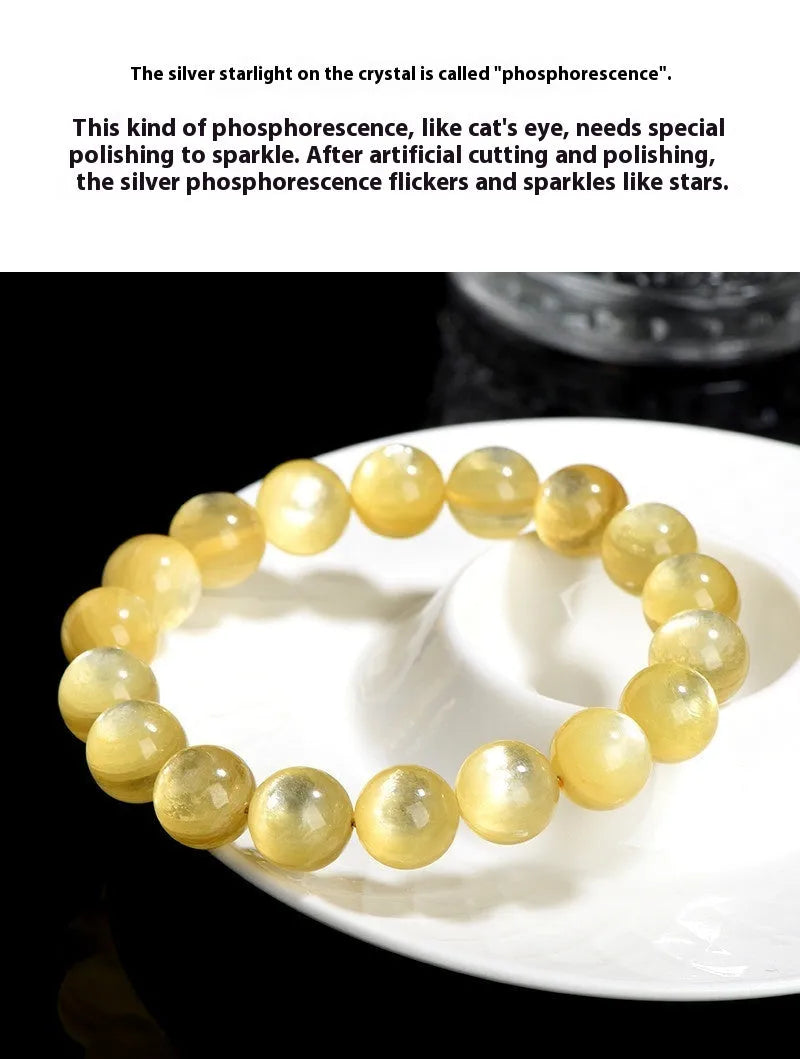 Yellow dragon gold lepidolite mica bead bracelet with geometric round beads on wrist