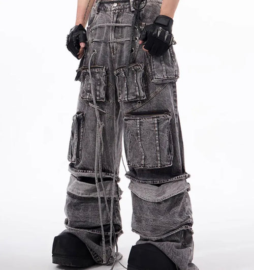 Grey distressed denim overalls with rope stitching detail on front