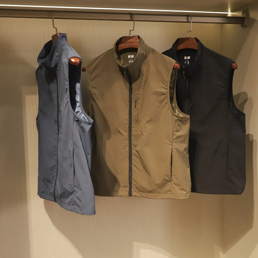 Men's thin nylon vest in Army Green, showing cardigan style and side seam pocket.