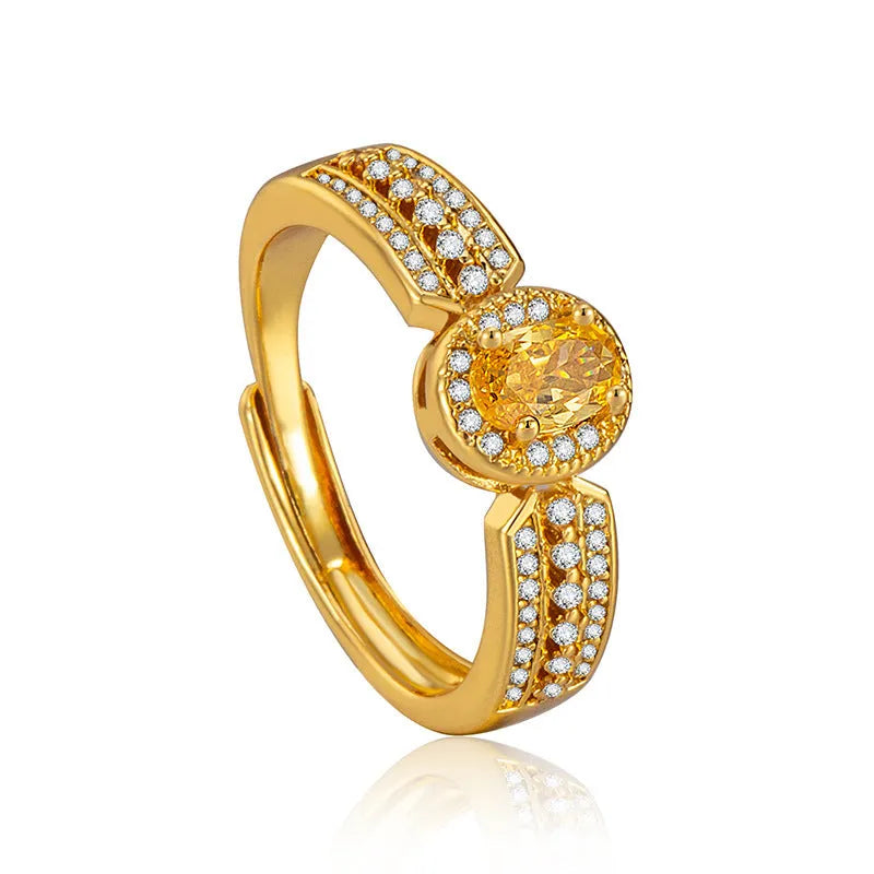 Champagne gold copper ring with open adjustable design and diamond setting against a white background