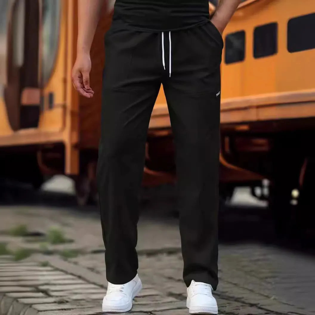 Men's casual polyester trousers for spring and autumn in various colours including light gray and black