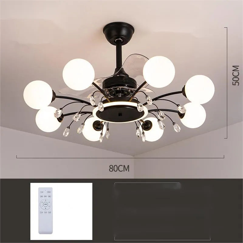 Gold and black ceiling fan lamp with acrylic shade and metal blades, showing remote control