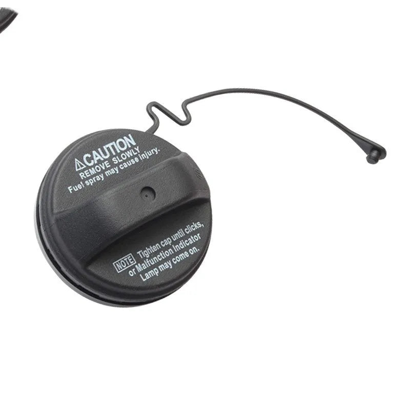 Black plastic Toyota snap-type replacement fuel tank cap