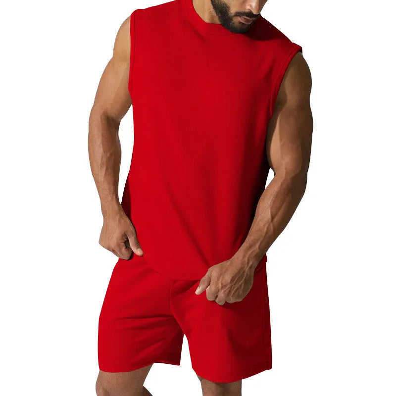 Men's sleeveless cotton blend sports suit showing sleeveless top and matching shorts in a solid colour.
