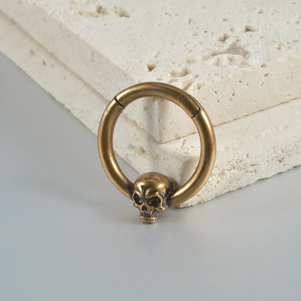 Copper vintage punk earrings with ghost head charms in antique silver or ancient gold finish.