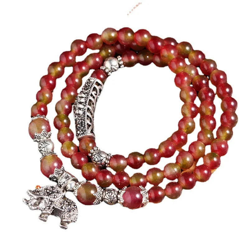 Natural watermelon crystal bracelet with Chinese knot design in 6mm and 8mm bead sizes