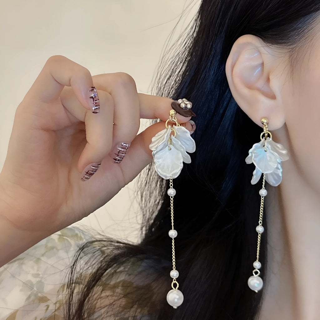Women's shell acrylic pearl tassel earrings showing 8.8cm length with four clip style options