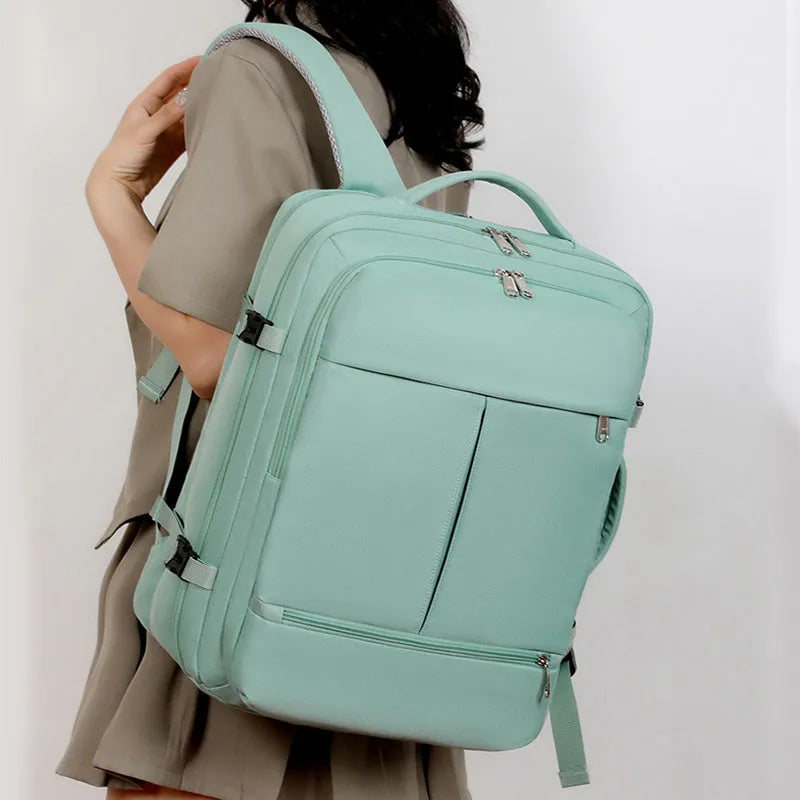 Waterproof Oxford cloth backpack in colour options showing multiple pockets and zippers, sized for a 15.6 inch laptop.
