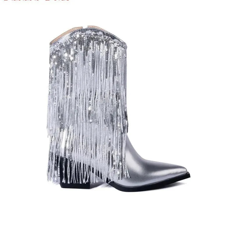 Women's black chunky heel tassel boots with a super high stiletto heel and pointed toe.