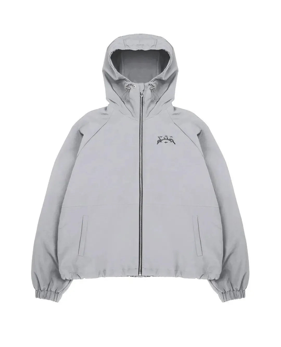 Man wearing a grey loose-fit hooded sunscreen jacket in British style.