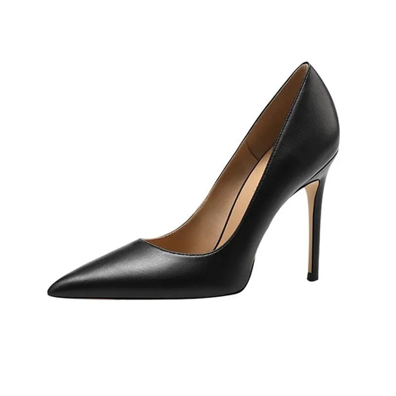 Black pointed toe stiletto high heel pump shoe with a low cut, shown on a white background.
