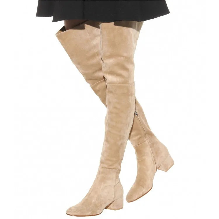 Grey suede women's over the knee flat boots with a pointed toe and thick low heel.